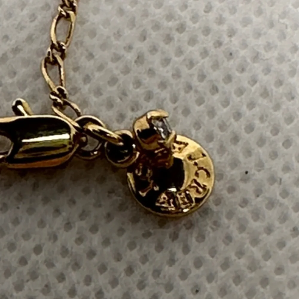 J. Crew Gold Tone Necklace with Green Faux Stone Elephant Charm – 25”